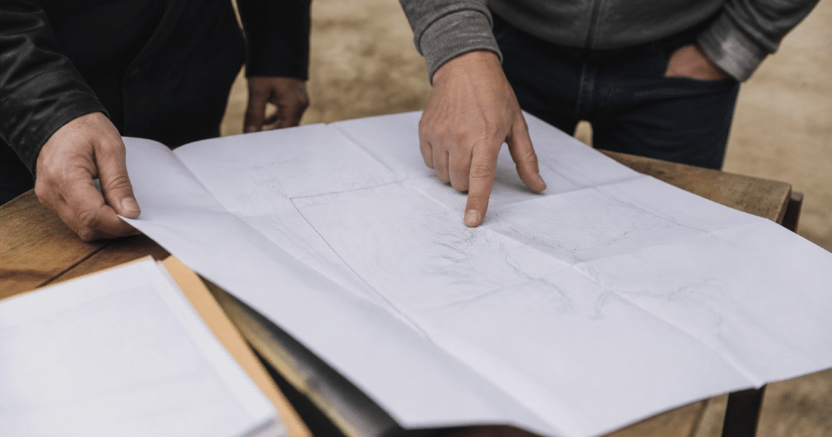 Devis chiffre sur document montrant cout amenagements terrain constructible